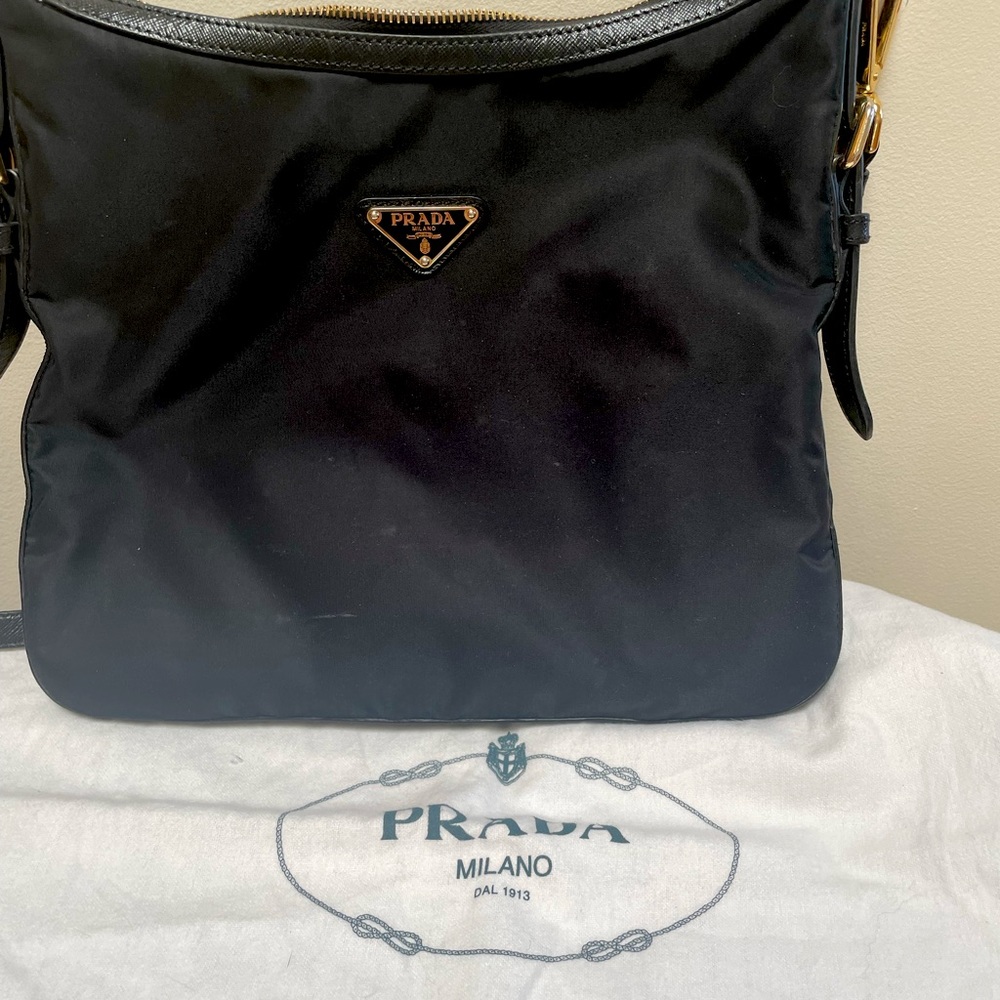 Beautiful crossbody Prada handbag in very good condition.  Measures 11 by 9 1/4
